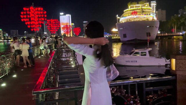 BellamissU in sexy white ao dai at night river cruise, gorgeous Vietnamese beauty