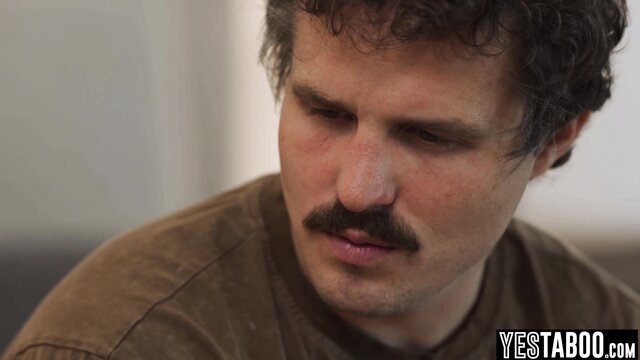 Kimmy Kimm closeup intense gaze seductive mustache man