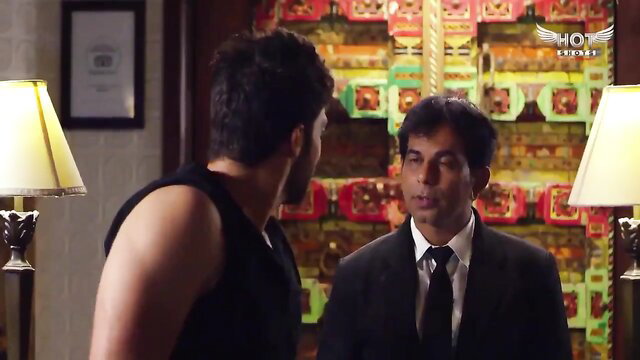 Indian erotic scene: skinny brunette tied up tight, nipples play with suited man