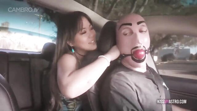 AstroDomina gags masked male in car with red ball gag, femdom tease