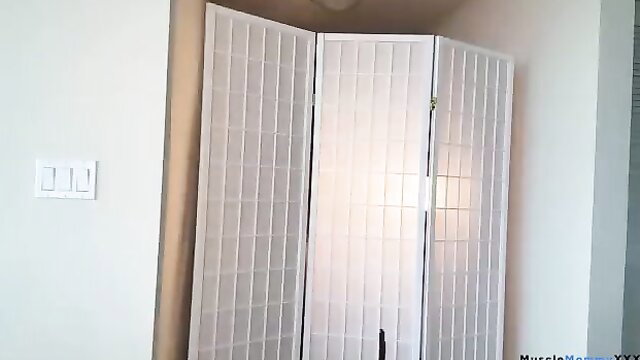 Slim Asian beauty in beach dress by shoji screen, soft lighting