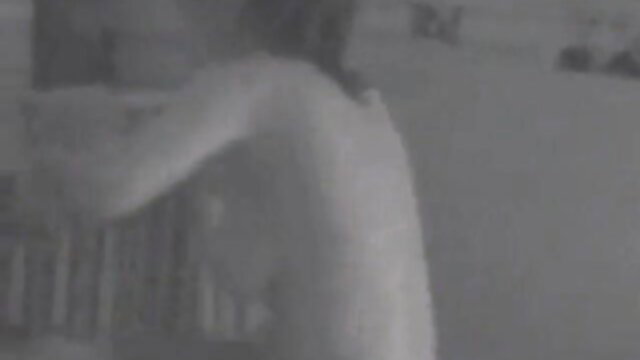 Big tits babe changing by window, voyeur view