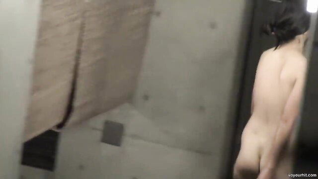 Nude Asian amateur girl with natural boobs in shower closeup