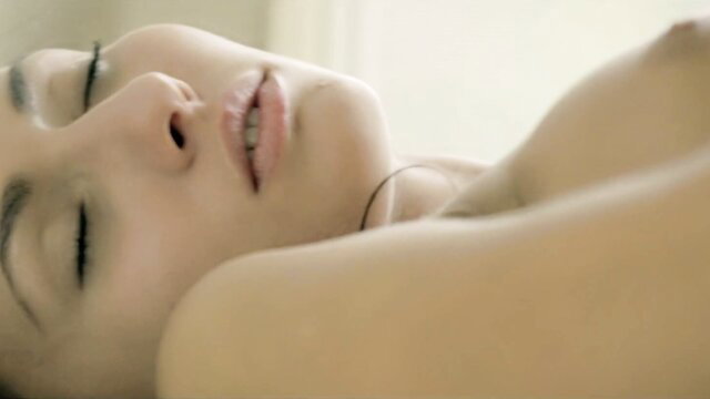 Michaela Isizzu topless beauty sleeping nude in bed