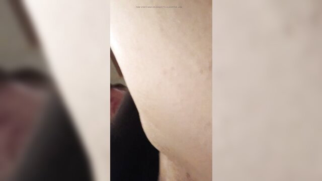 Blurry closeup of pale woman's curvy hip and thigh in mixed HD amateur video