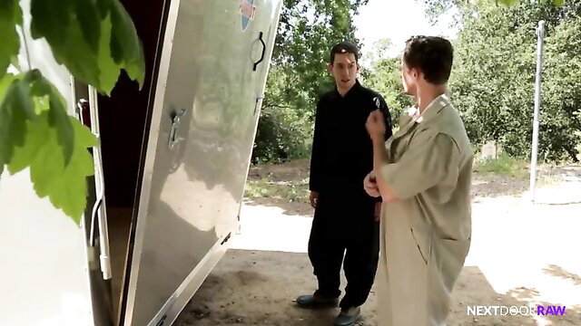 Two hot guys in trailer talk before bareback ass pounding