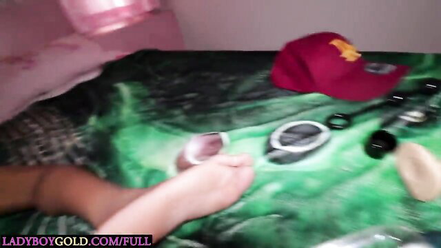Young Thai femboy Kimmy's feet on bed with toys, obese ass teased