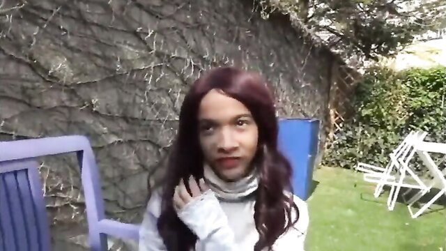 Mixed-race teen with huge tits in turtleneck, outdoor close-up