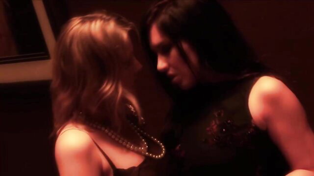Paige Ashley lesbian kiss with blonde in lingerie necklace
