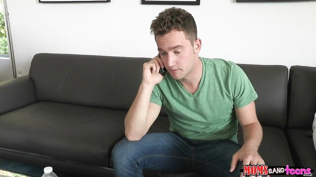 Handsome guy on phone in green shirt, MILF bangs teens scene
