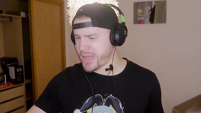 Guy with headset grimacing in horny slime girl fuck fail scene