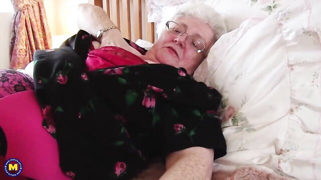 British big mature grandma Caroline V sleeping in lingerie