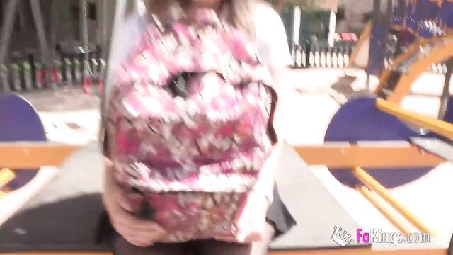 Young Spanish amateur with floral backpack at playground, teasing upskirt