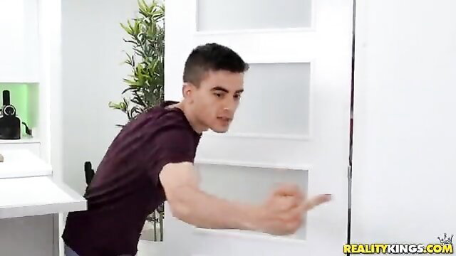 Young guy points finger excitedly in tight shirt, Reality Kings porn preview