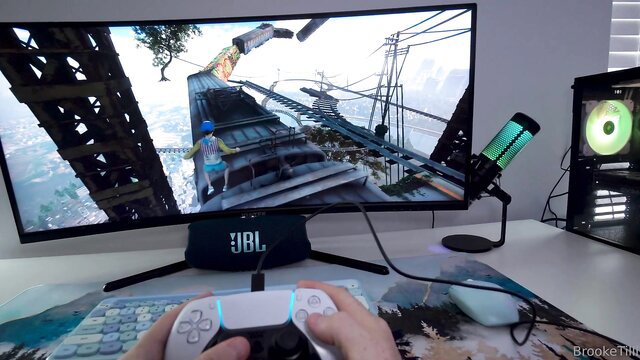 Brooketilli's VR gaming setup with PS5 controller on desk