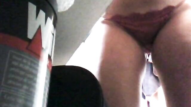 Stunning mom drops trousers flashing wet red panties & thick thighs upskirt