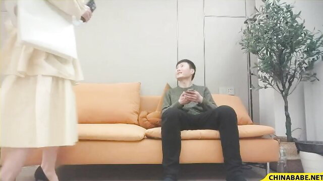 Chinese amateur teen in skirt teases guy on couch