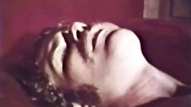 Retro blonde bombshell with ecstatic expression in vintage adult scene