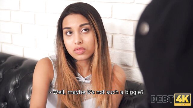 Pretty slim petite hottie in tank top says it's not such a biggie to pay debt