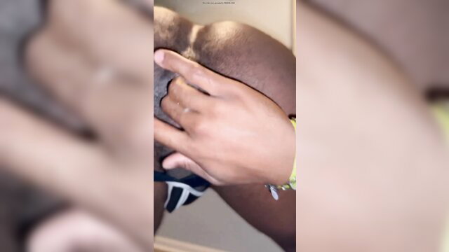 Ebony guy spreading thick ass cheeks in solo hole play tease