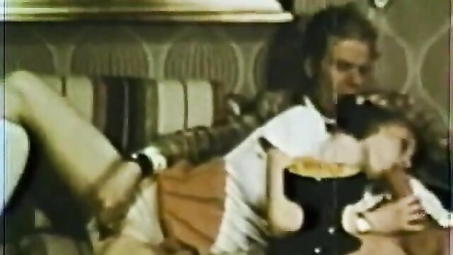 Vintage Pussycat 443: Daddy embraces young girl in skirt on couch