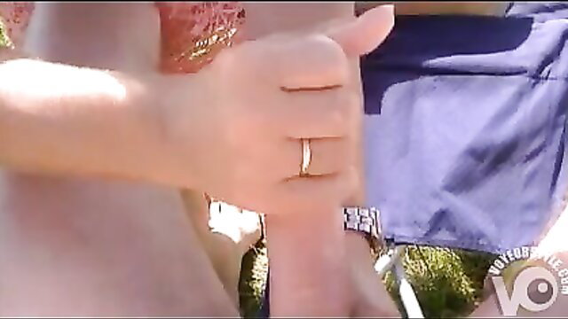 Wife's handjob on cock by lakeside in bikini, amateur outdoor