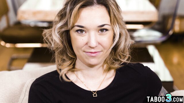 Nicki Hunter smiling in black top, funding studies with sex