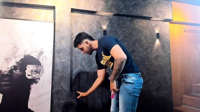 Muscular Indian guy bending over in tight jeans, bulging ass tease