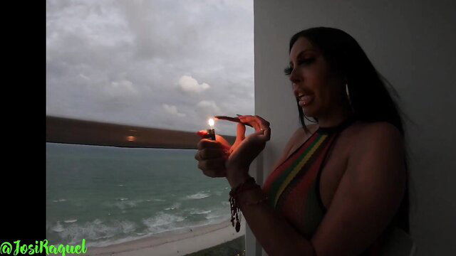 Josi Raquel lighting joint in bikini, busty Latina beach view