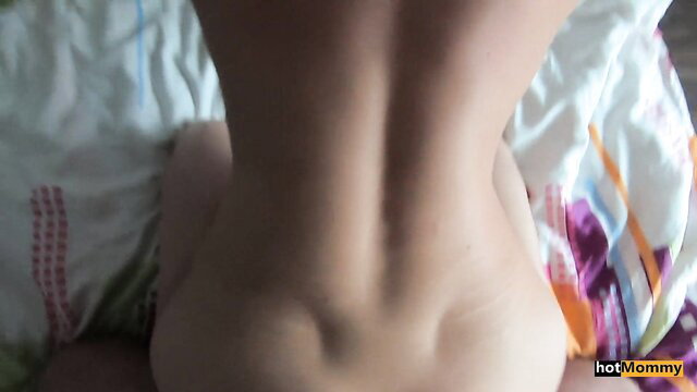 Hot stepmom's bare back and ass view on bed