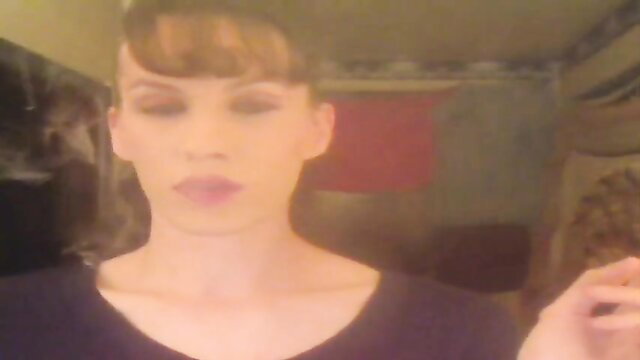 Mature pale bitch with bangs chainsmoking 100s cigarettes closeup