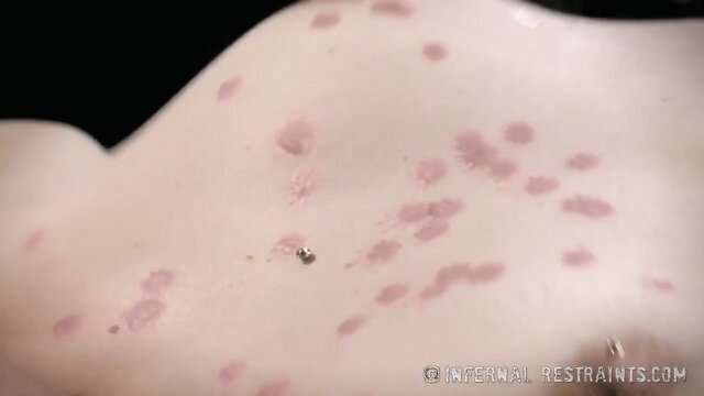 Cute blonde's red spanked ass with piercings in upskirt paddling