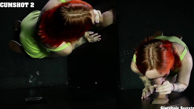 Red-haired woman performing oral sex