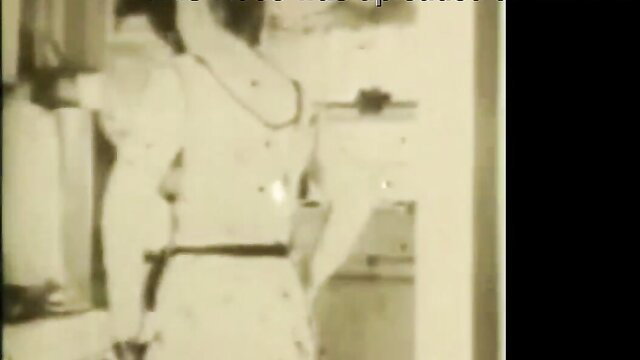 Retro blonde in white dress flashes unshaved pussy in kitchen