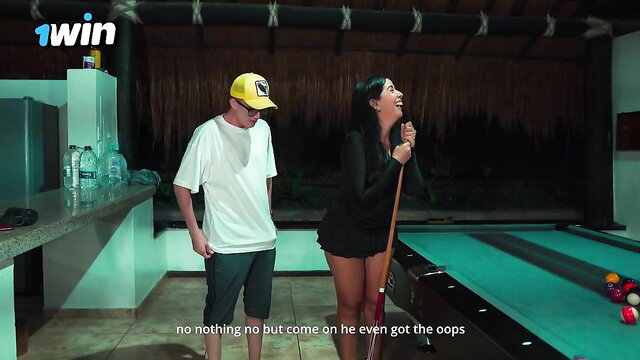 Lina Henao in skimpy black dress plays pool with nerdy guy