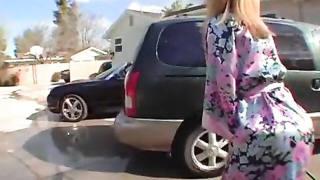 Nina Hartley washes car in sexy pink lingerie, big ass view