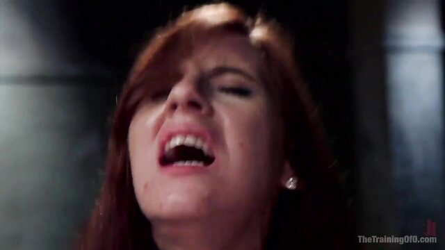 Pretty redhead slave screaming in ecstasy during BDSM slut training