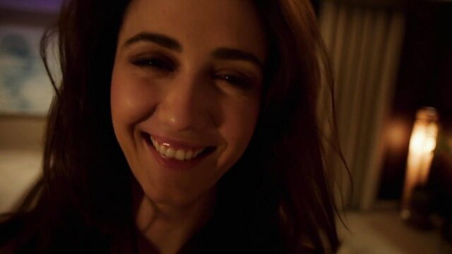 Madeline Zima smiling seductively in dim-lit room, #Stuck 2014