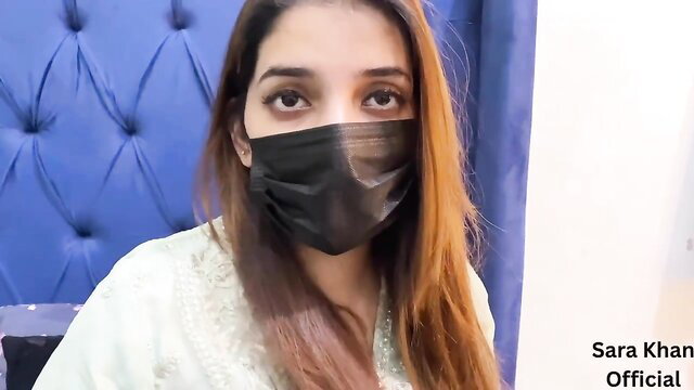 Sara Khan masked Pakistani beauty in white lace dress closeup