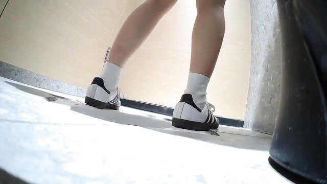 Asian girl white socks Adidas sneakers bending over KTV toilet spy cam