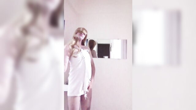 Blonde babe Soumya Roy in towel, teasing in bathroom mirror