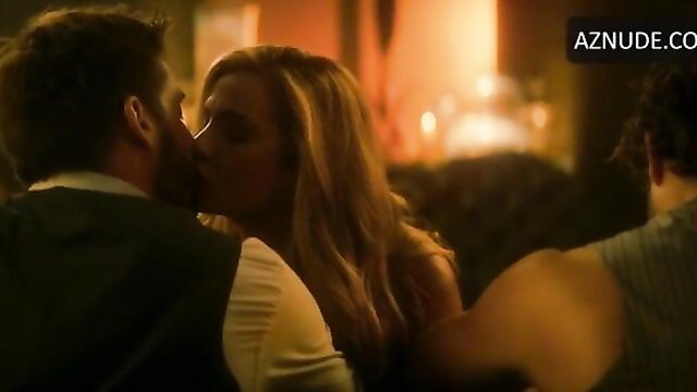 Clara Morgane kissing man in threesome scene from Escort Boys