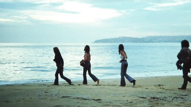 Rebecca Gilling, Victoria Anoux walking beach in Stone 1974