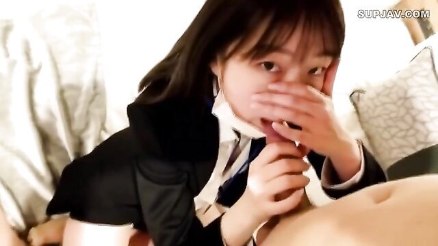 Asian office lady in uniform sucking cock closeup