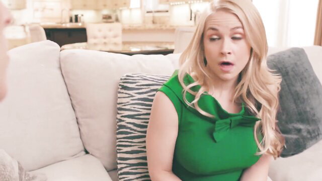 Blonde in green dress shocked on couch, hot wife secret exposed