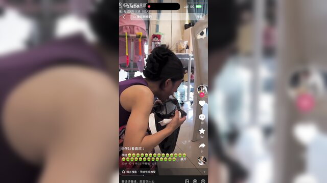 Chinese woman with morning sickness vomiting loudly in store