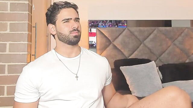 Handsome Latino man with beard in tight white tee on bed jerk off tease