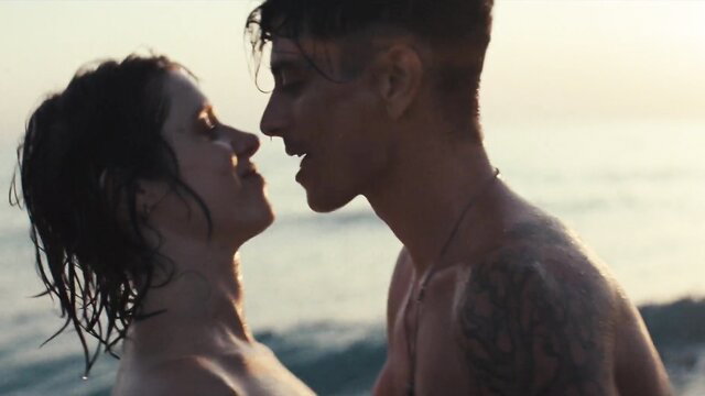 Daphne Patakia wet topless beach kiss with tattooed hunk