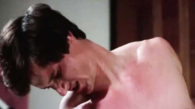 Taboo II muscular man grimacing in ecstasy closeup