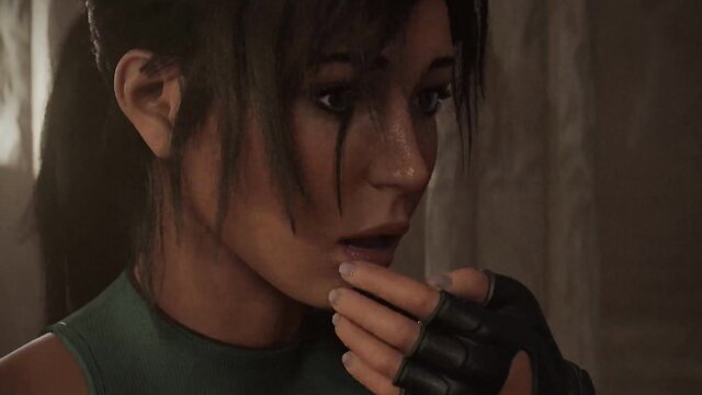 Lara Croft closeup shocked expression in tight green top